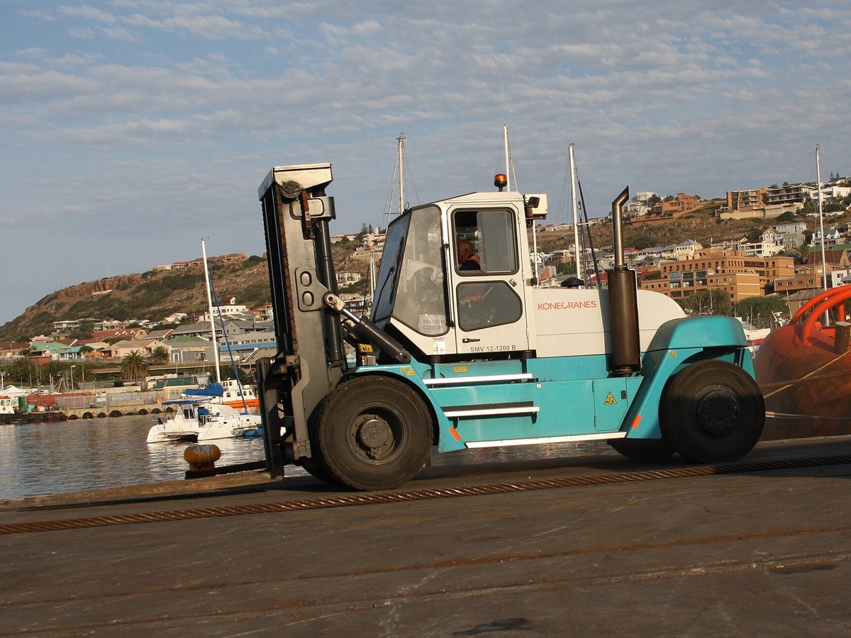 Heavy-duty Konecranes lift truck handling freight at an industrial terminal